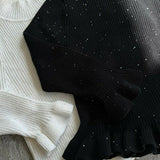 tricot à volants et paillettes