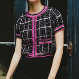 cardigan en tweed à carreaux