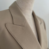 veste sur mesure à double boutonnage avec motif cousu