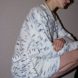 Speckled side ribbon knit