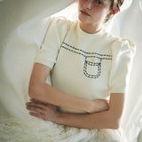 half sleeve stitch knit tops