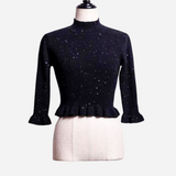 tricot à volants et paillettes