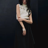 sleeve less ribbon slit knit