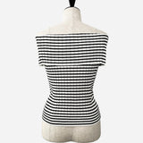 tricot à épaules dénudées avec boutons pointus