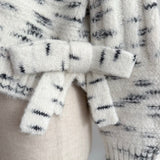 Speckled side ribbon knit