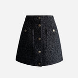Jupe boutonnée en tweed pailleté