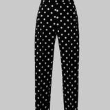 Pantalon fuselé à pois et fermeture éclair